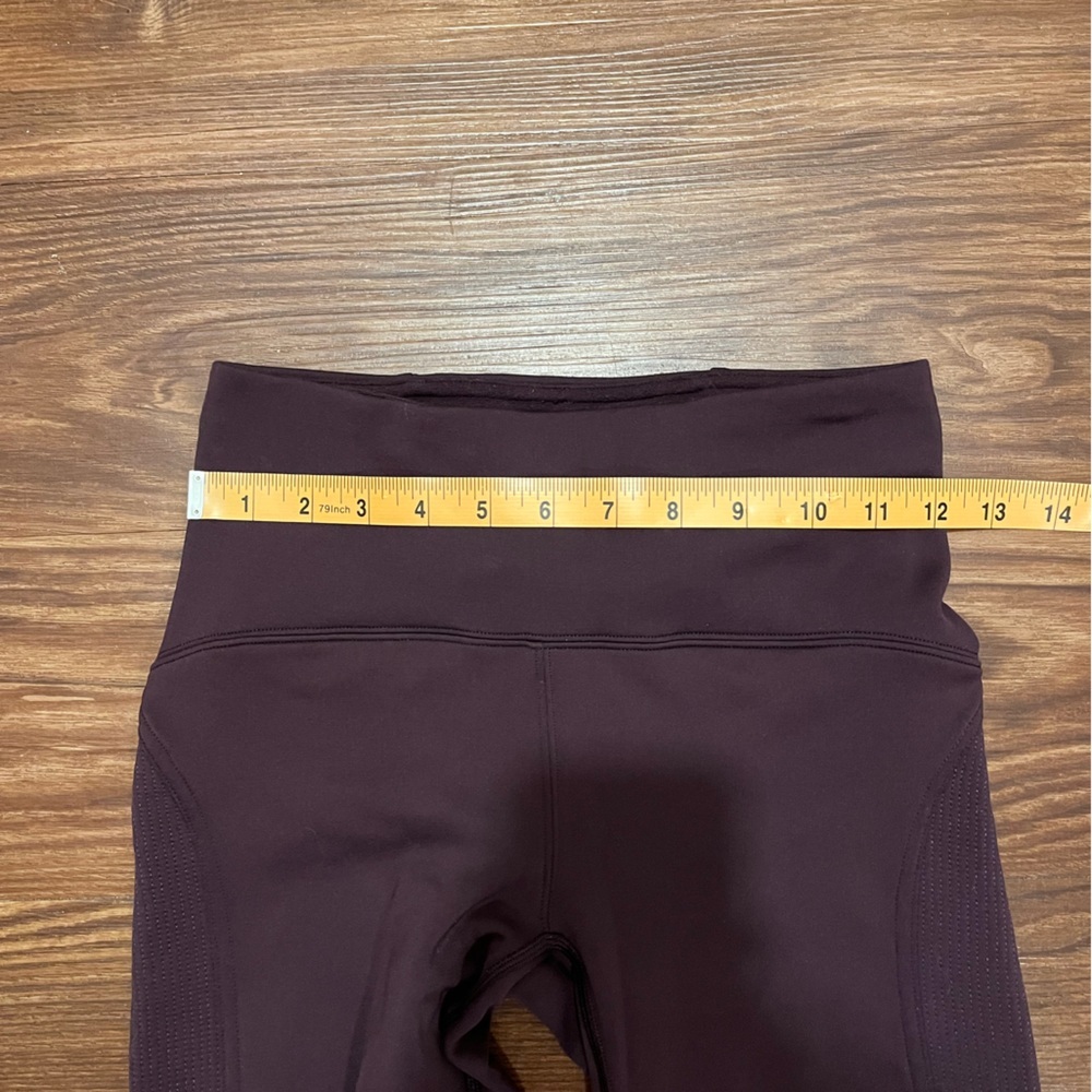Lululemon Fast As Fleece Tight
Black Cherry Womens Size 4
Reflective Pocket - Picture 6 of 14